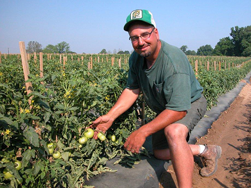 Photo: Farmer in field.