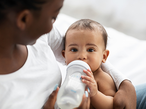 Photo: Milk in the front and baby in the back.
