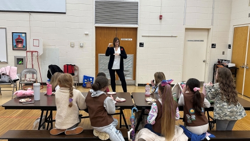 FCHS educator teaches Girl Scout troop about nutrition.